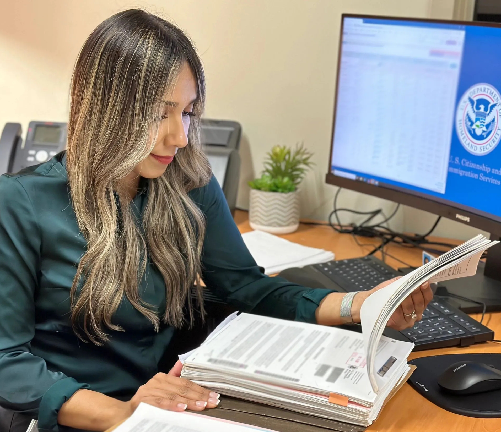 Leticia Torres working at USCIS Santa Ana.